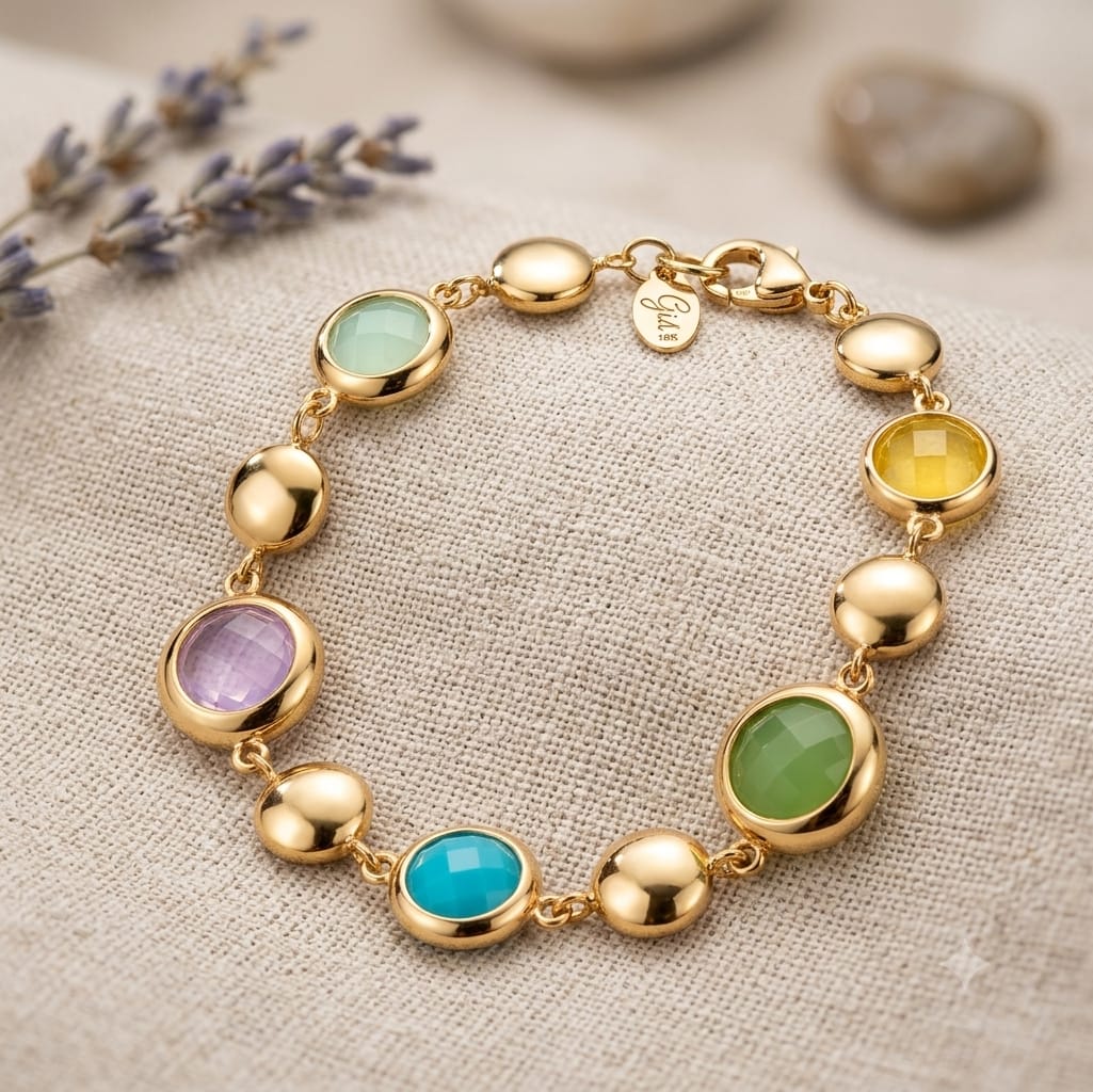 Bracciale in acciaio dorato con dischi di cristalli colorati