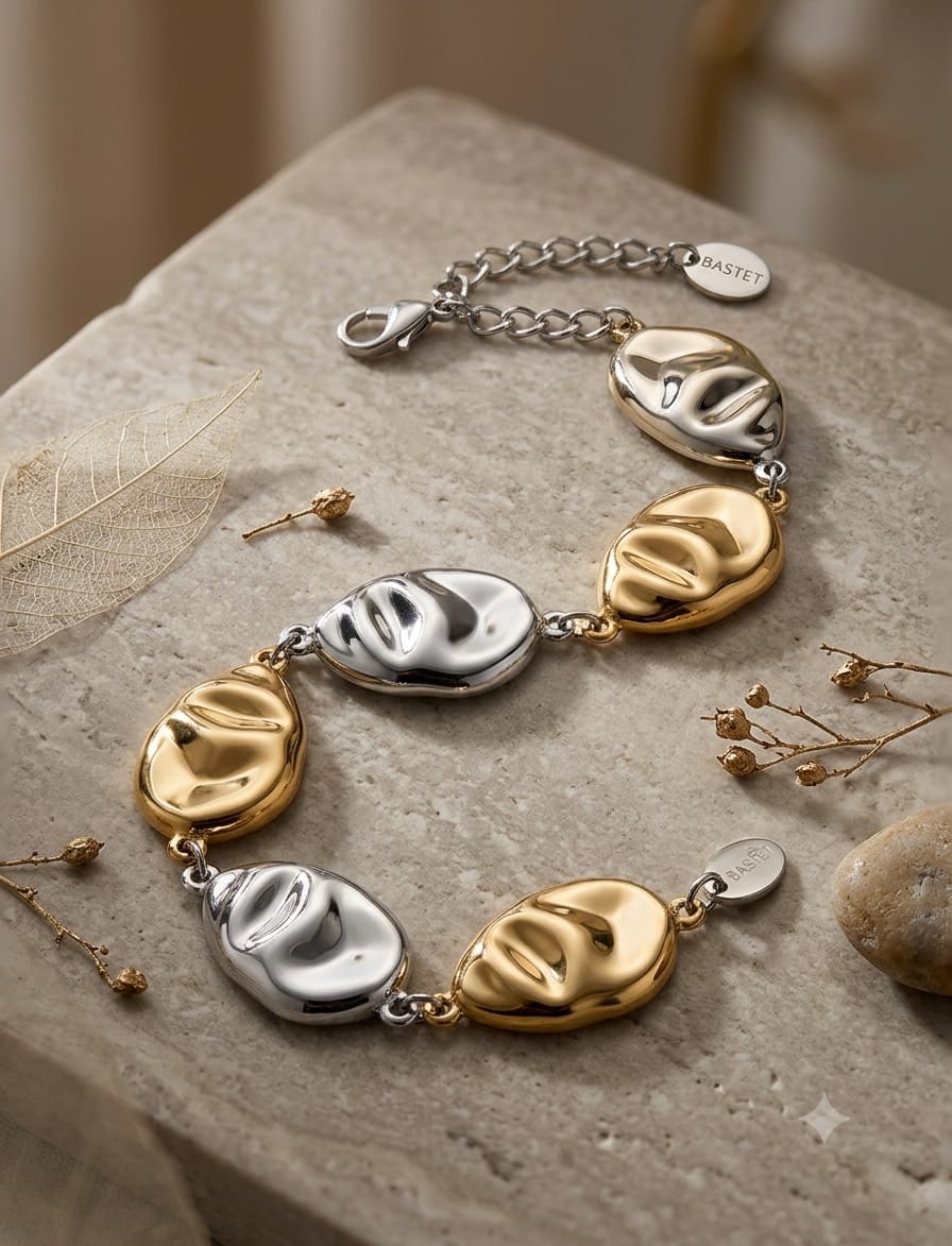 Bracciale in acciaio bicolor oro e argento con ciondoli a maschera