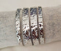 Bracciale rigido in acciaio argentato martellato