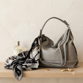 Borsa in ecopelle grigia con tracolla